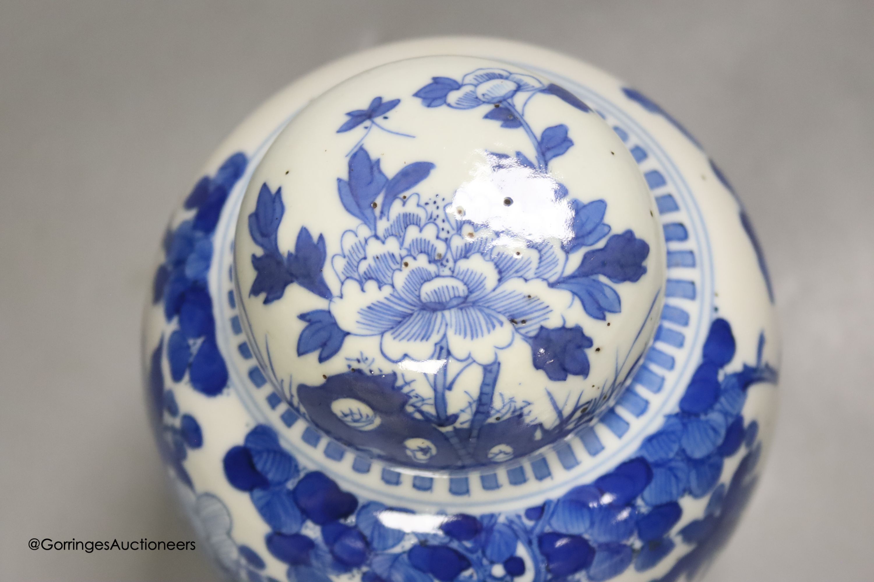 A Chinese blue and white 'birds and flowers' jar and cover, Kangxi mark, c.1900, height 15cm